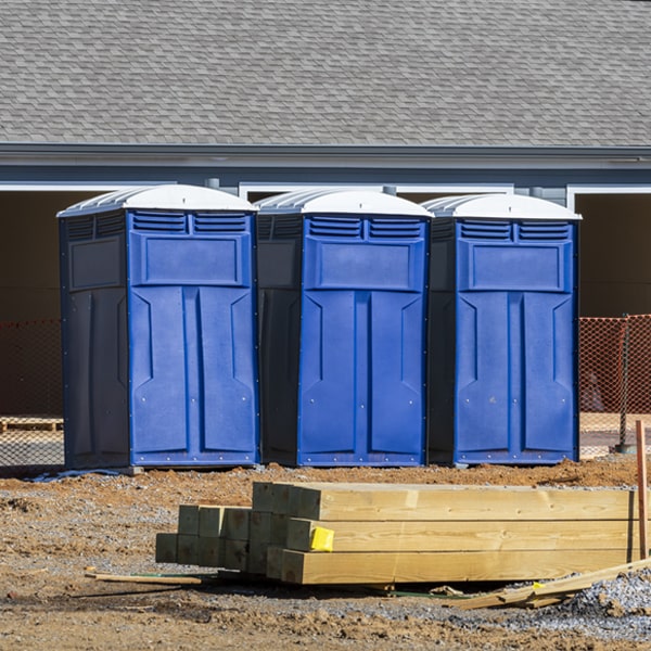 what is the cost difference between standard and deluxe porta potty rentals in Dover TN